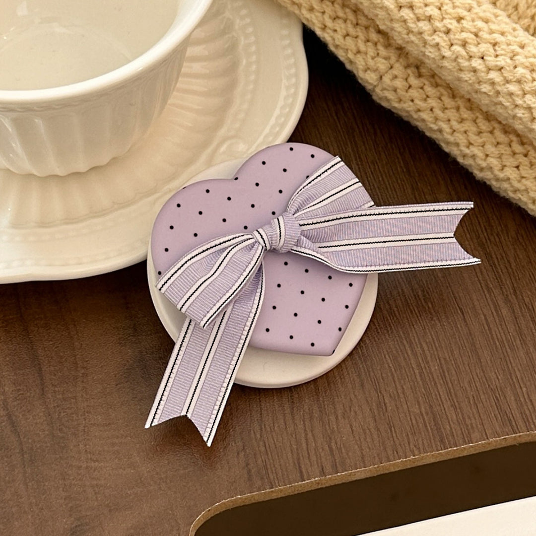 Heart-shaped cosmetic box with bow motif Bowlift