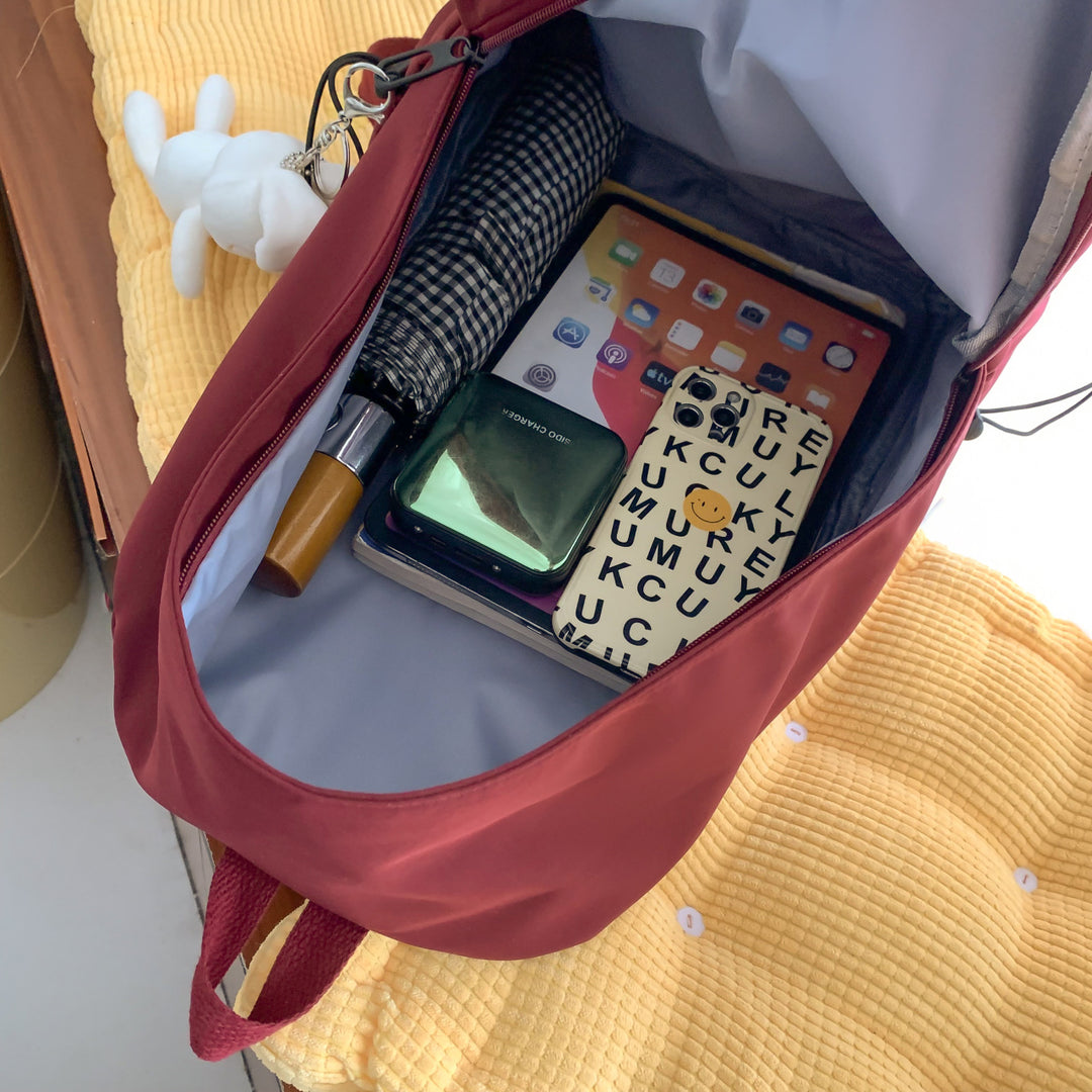 Multi-functional backpack with integrated keychain Bowlift