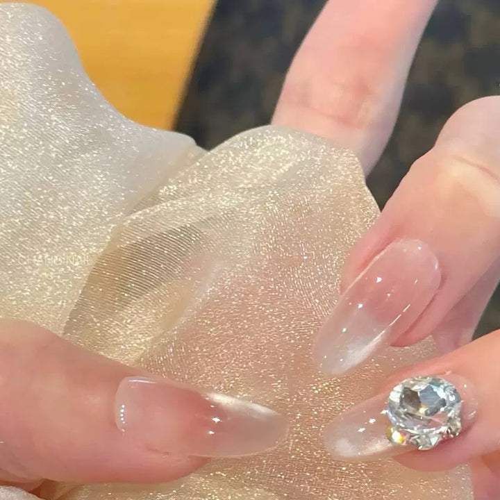 Elegant artificial nail tips with glitter accent Bowlift