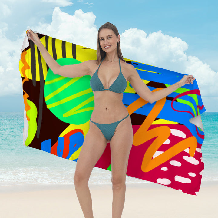 Beach towel with vibrant tropical plant motif Bowlift
