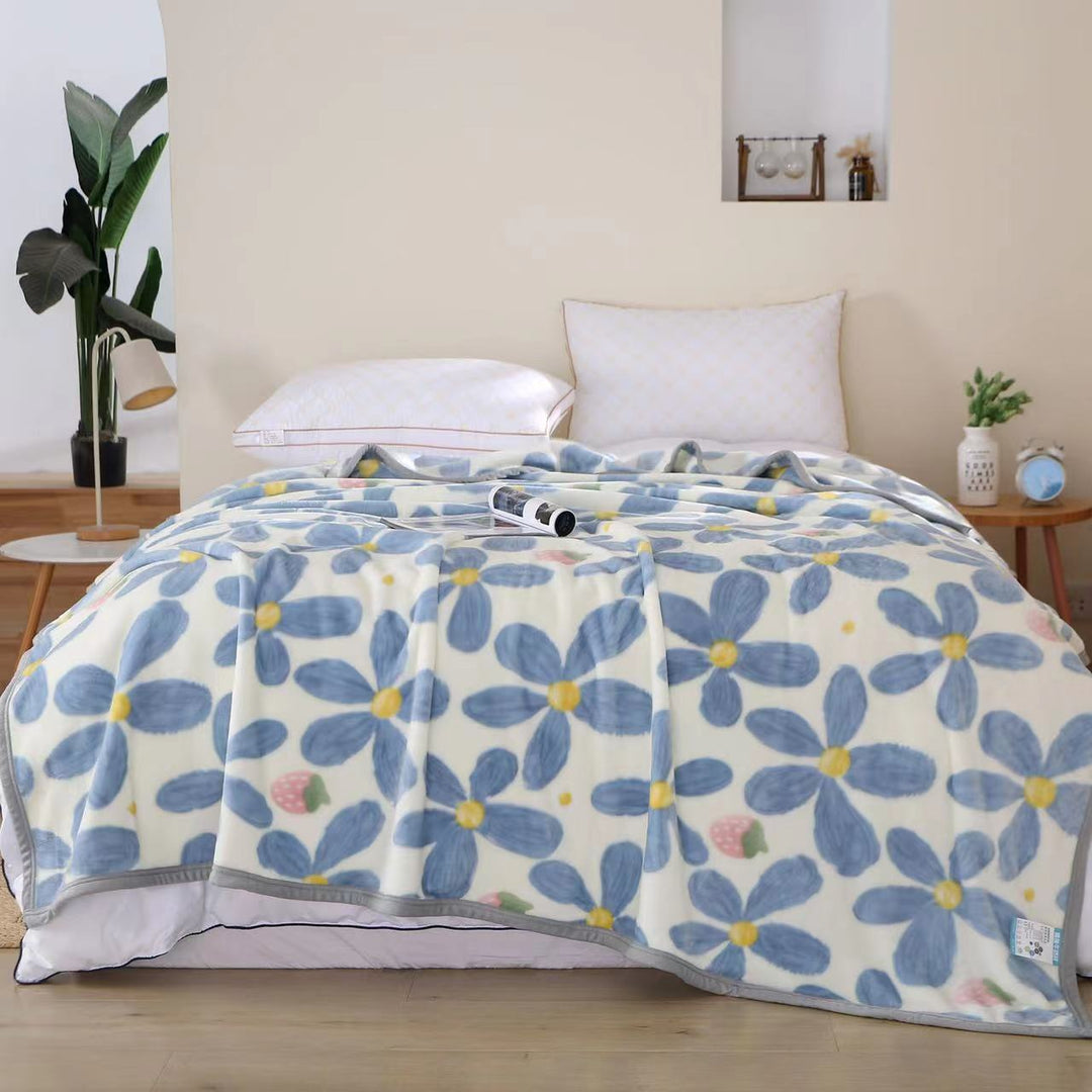 Women's cozy fleece blanket with playful cloud pattern Bowlift