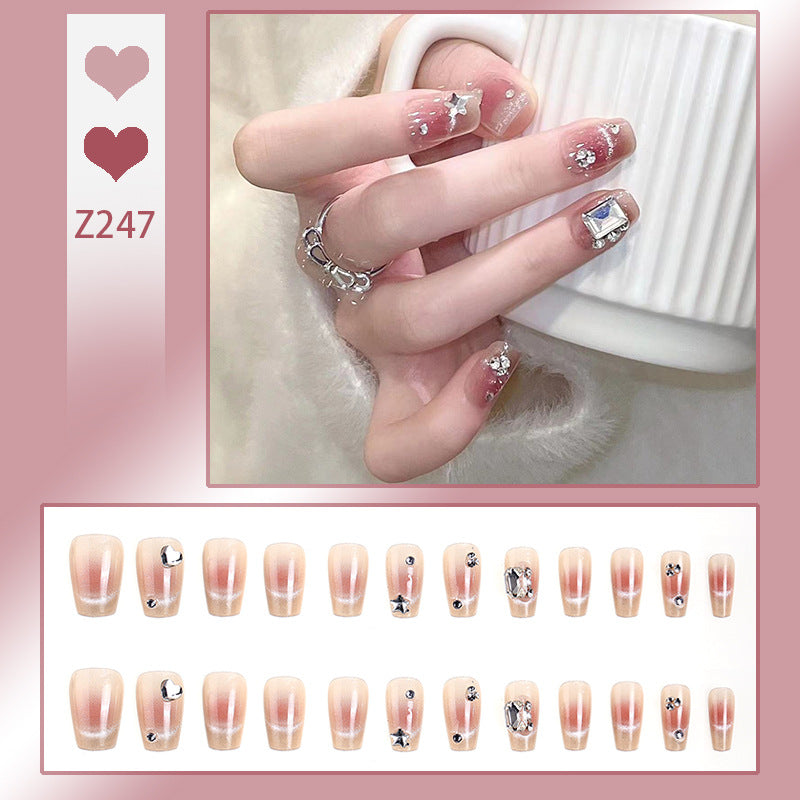 Artificial nail set with elegant glitter and star decorations Bowlift