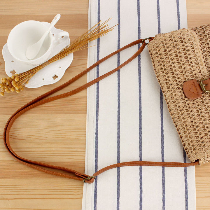 Handbag with Smart Closure System and Adjustable Strap Bowlift