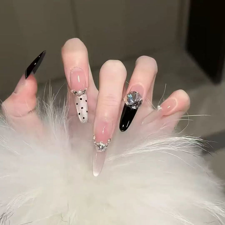 Glamorous artificial nail tips with elegant decorations Bowlift