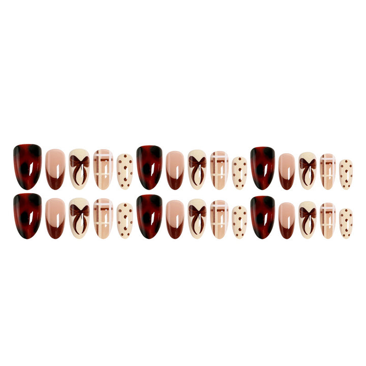 Artificial nail set with elegant bow and caramel designs Bowlift