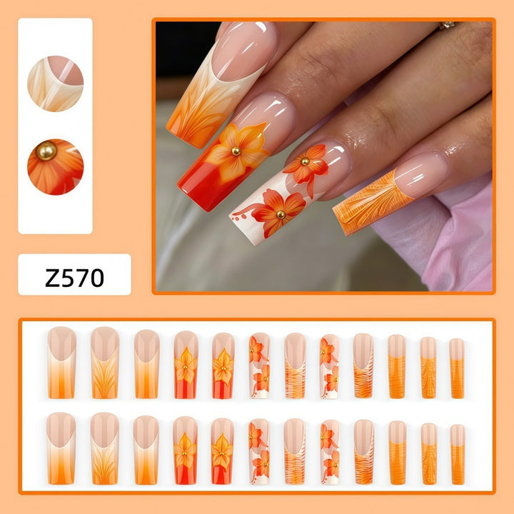 Nail art with floral accents and glitter Bowlift