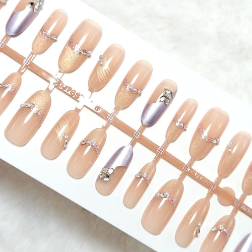 Artificial nails with modern glitter and stone embellishments Bowlift