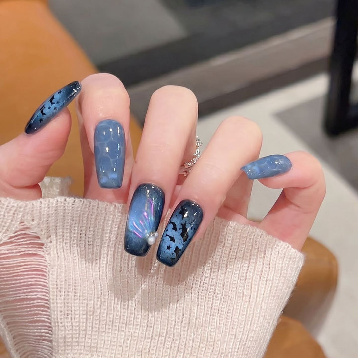 Artistic Press-On Nail Set with Starry Night Design Bowlift