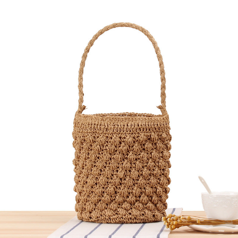 Hand-knotted bucket bag with textured surface Bowlift