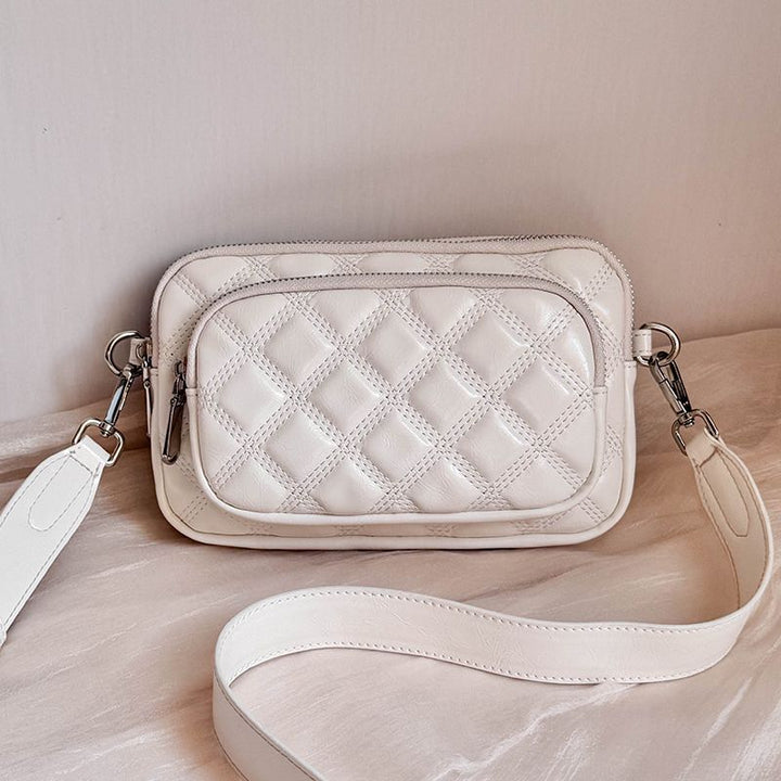 Shoulder bag with stylish quilted pattern Bowlift