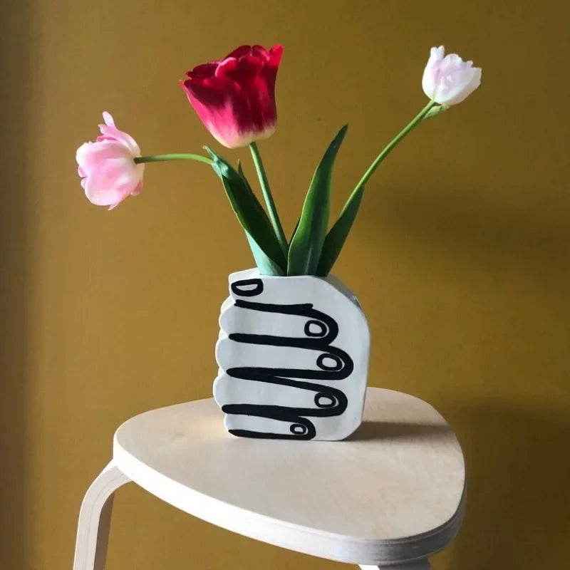 Hand Holding Flowers Vase | Bowlift