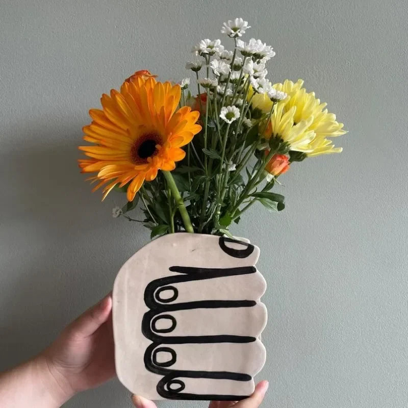 Hand Holding Flowers Vase | Bowlift