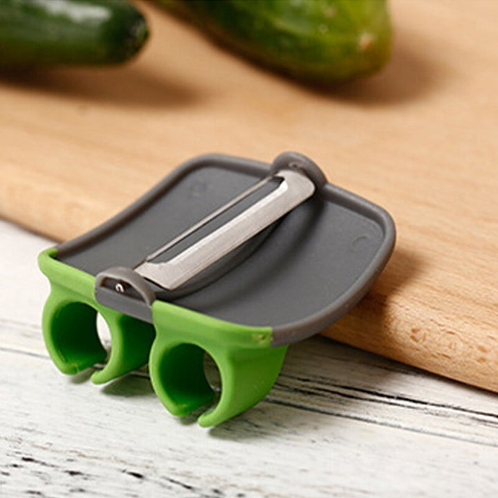 FingerGuard - Veilig Groenteschiller voor de Keuken Bowlift