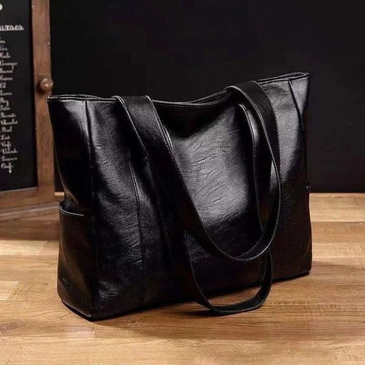 Elegant Leather Shoulder Bag with Retro Style and Smooth Surface