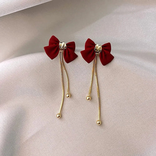 BowLift | Dainty Bow Gold Dangle Earrings
