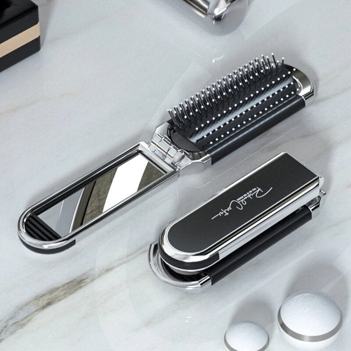 Compact hairbrush with integrated mirror | Bowlift