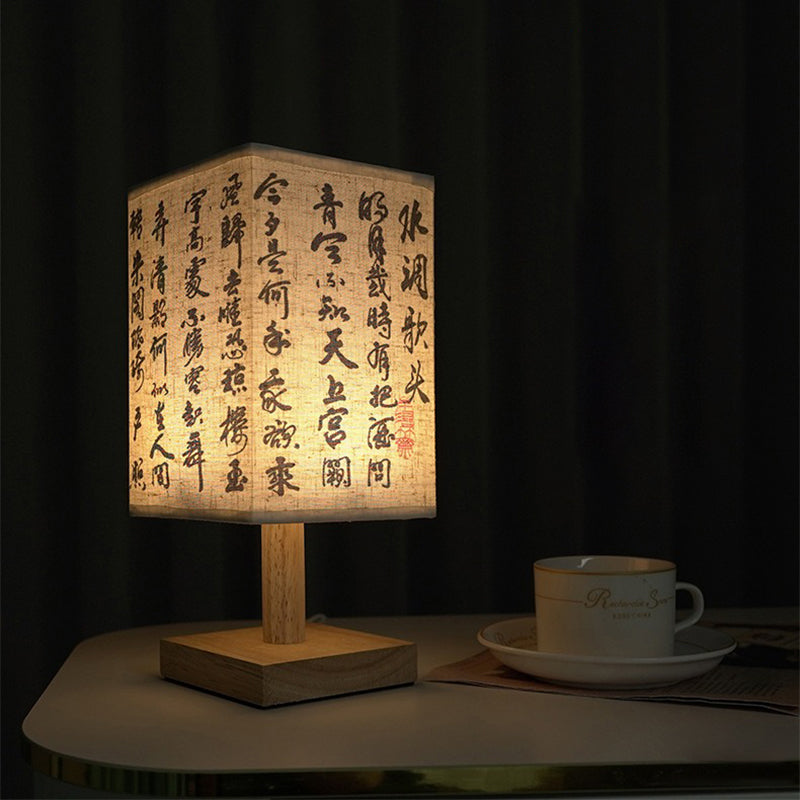 LED table lamp in a square design – wooden base with Japanese pattern | Bowlift