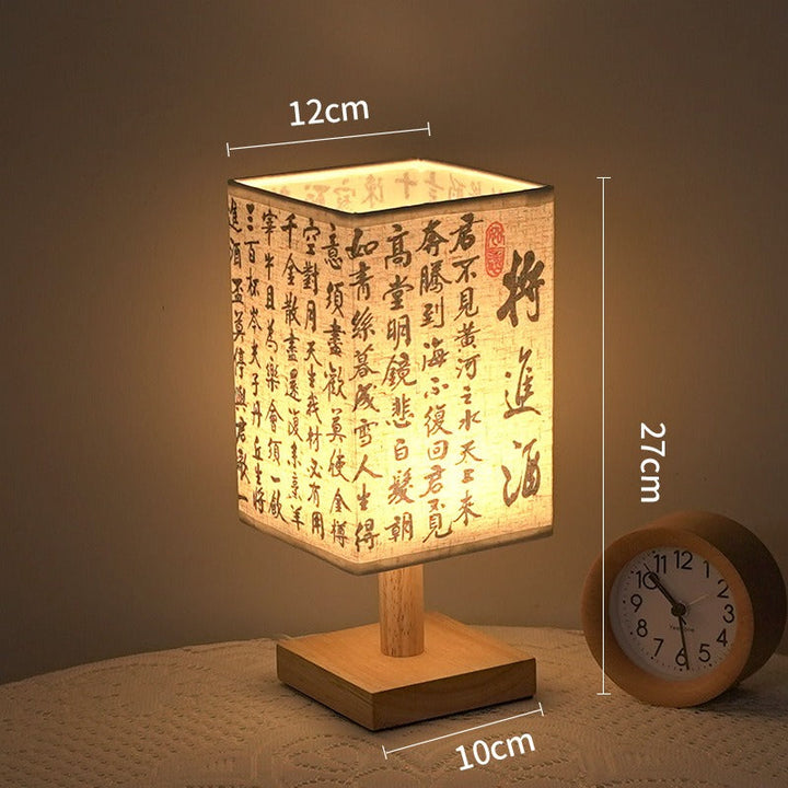 LED table lamp in a square design – wooden base with Japanese pattern | Bowlift