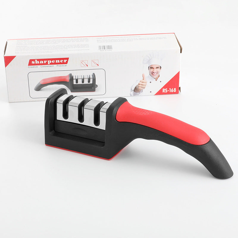 Knife sharpener with removable sharpening stone