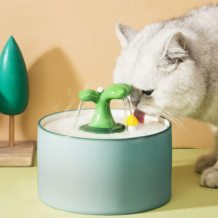 Heated ceramic drinking fountain for pets